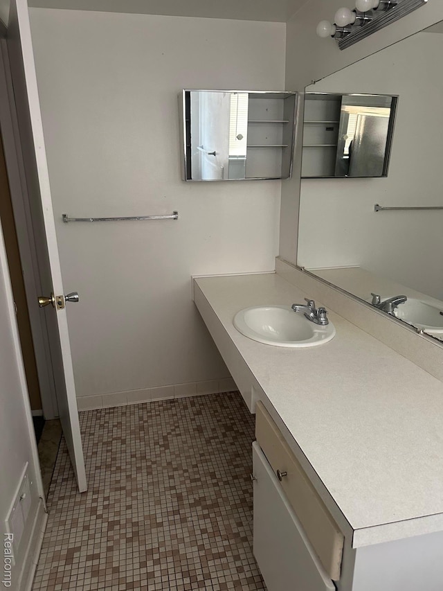 25332 Shiawassee Cir, Southfield, MI 48033 - bathroom featuring vanity and baseboards