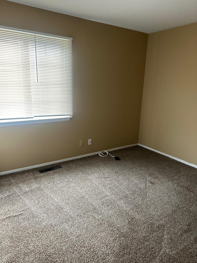 25332 Shiawassee Cir, Southfield, MI 48033 - unfurnished room with carpet floors and baseboards