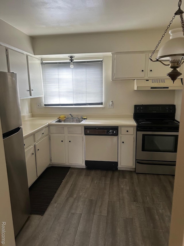 25332 Shiawassee Cir, Southfield, MI 48033 - kitchen featuring appliances with stainless steel finishes, exhaust hood, a sink, dark wood-style flooring, and light countertops