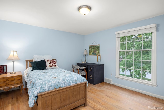 2960 Timberwyck Trail Dr, Troy, MI 48098 - bedroom with light wood-style flooring and baseboards