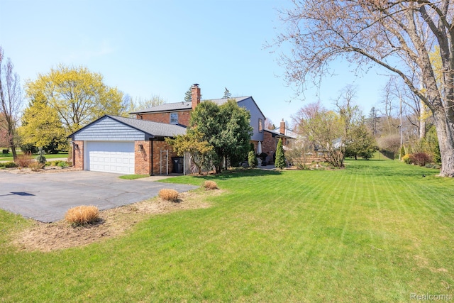 2960 Timberwyck Trail Dr, Troy, MI 48098 - view of front facade featuring driveway, an attached garage, brick siding, and a front yard