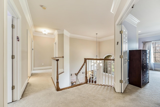 2129 Autumn Hill Dr, Ann Arbor, MI 48103 - hall featuring carpet floors, an upstairs landing, ornamental molding, and baseboards
