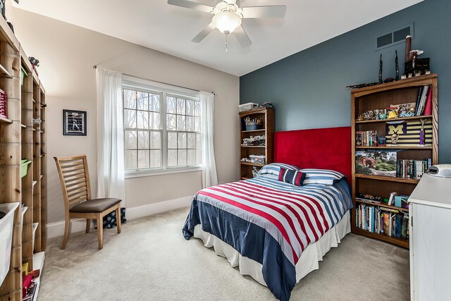 2129 Autumn Hill Dr, Ann Arbor, MI 48103 - carpeted bedroom featuring baseboards and ceiling fan