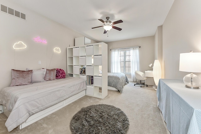 2129 Autumn Hill Dr, Ann Arbor, MI 48103 - bedroom with light carpet and a ceiling fan