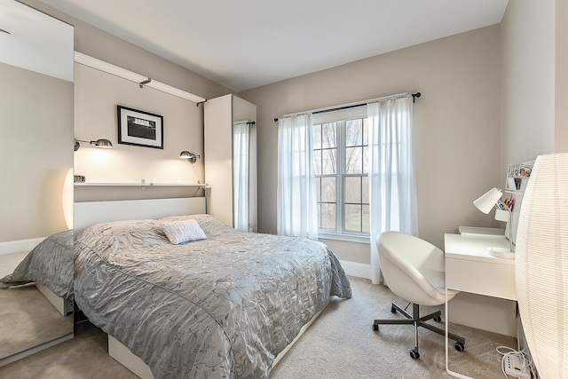 2129 Autumn Hill Dr, Ann Arbor, MI 48103 - bedroom featuring carpet, baseboards, and a desk