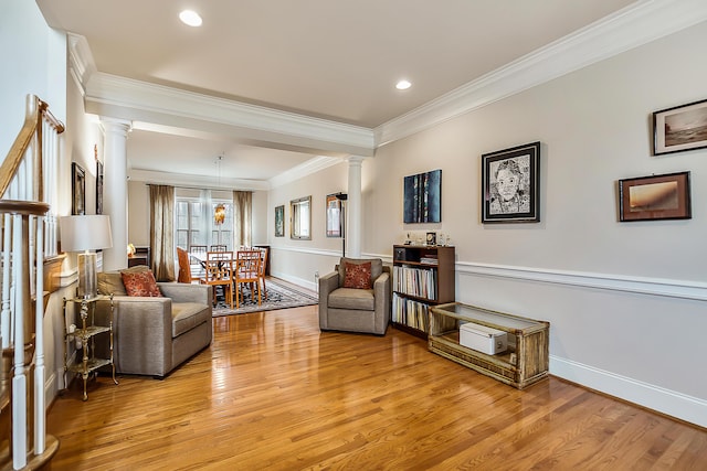 2129 Autumn Hill Dr, Ann Arbor, MI 48103 - living area featuring decorative columns, crown molding, light wood-style flooring, recessed lighting, and baseboards