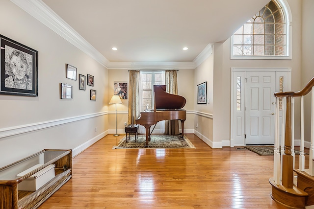 2129 Autumn Hill Dr, Ann Arbor, MI 48103 - foyer with light wood finished floors, ornamental molding, baseboards, stairs, and recessed lighting