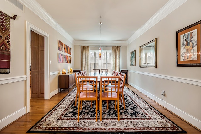 2129 Autumn Hill Dr, Ann Arbor, MI 48103 - dining space featuring hardwood / wood-style flooring, ornamental molding, and baseboards