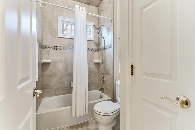 2129 Autumn Hill Dr, Ann Arbor, MI 48103 - bathroom featuring shower / tub combo with curtain and toilet