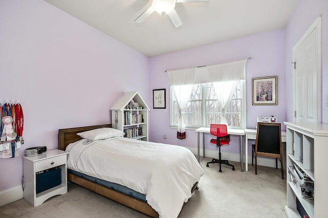 2129 Autumn Hill Dr, Ann Arbor, MI 48103 - carpeted bedroom featuring baseboards and ceiling fan