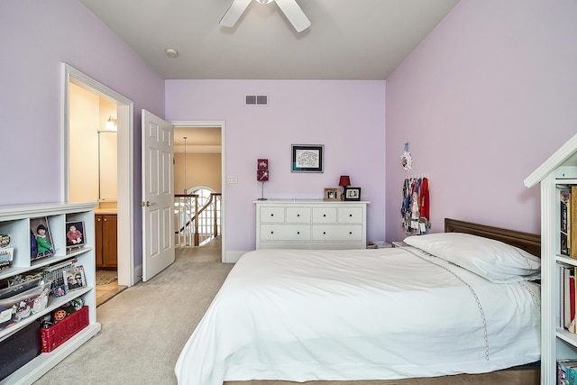2129 Autumn Hill Dr, Ann Arbor, MI 48103 - bedroom featuring light colored carpet, ensuite bathroom, and ceiling fan