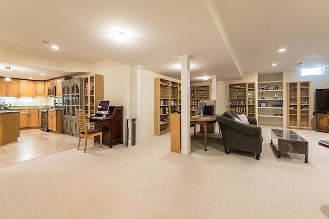 2129 Autumn Hill Dr, Ann Arbor, MI 48103 - living area featuring light colored carpet, an office area, decorative columns, recessed lighting, and built in shelves