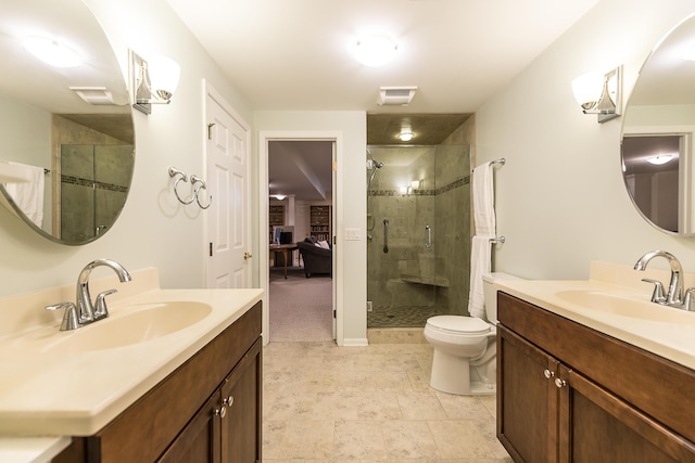 2129 Autumn Hill Dr, Ann Arbor, MI 48103 - bathroom with a shower stall, two vanities, and toilet