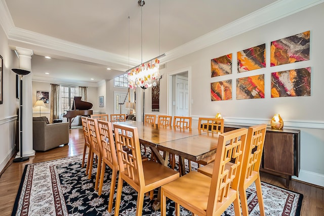 2129 Autumn Hill Dr, Ann Arbor, MI 48103 - dining room featuring crown molding, wood finished floors, and recessed lighting