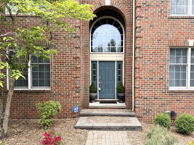 2129 Autumn Hill Dr, Ann Arbor, MI 48103 - property entrance featuring brick siding