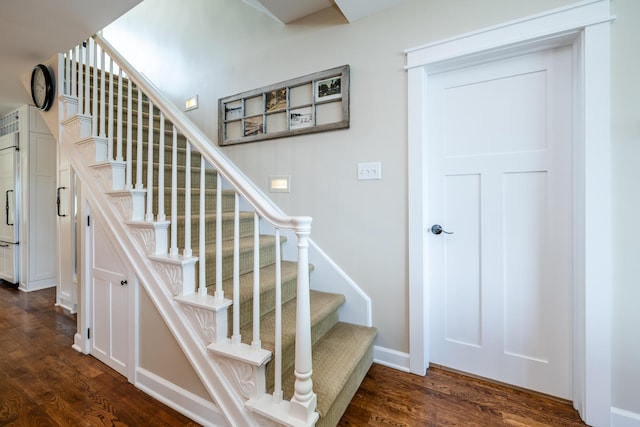7881 Lakewood Dr, Coloma, MI 49038 - stairs featuring wood finished floors and baseboards