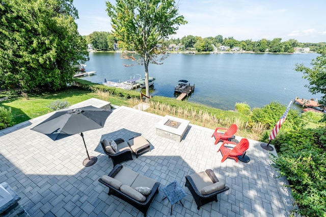 7881 Lakewood Dr, Coloma, MI 49038 - view of patio / terrace featuring an outdoor fire pit and a water view