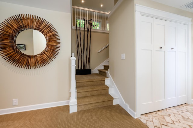 7881 Lakewood Dr, Coloma, MI 49038 - staircase with carpet floors and baseboards