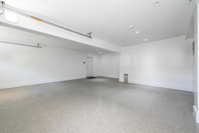 7881 Lakewood Dr, Coloma, MI 49038 - garage featuring baseboards and recessed lighting