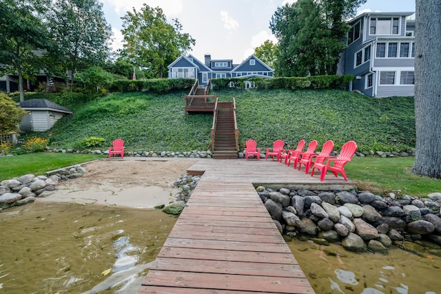 7881 Lakewood Dr, Coloma, MI 49038 - view of yard with stairs and a water view