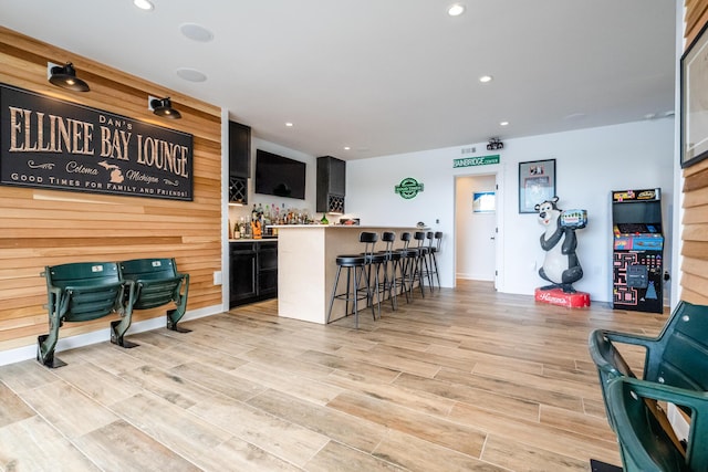 7881 Lakewood Dr, Coloma, MI 49038 - indoor dry bar with light wood-type flooring and recessed lighting