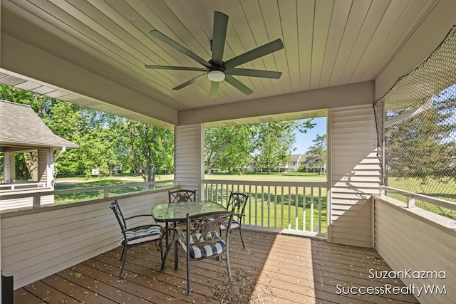 1323 Gleneagle Pl Unit 7, Hudsonville, MI 49426 - wooden terrace featuring ceiling fan, a yard, and outdoor dining area
