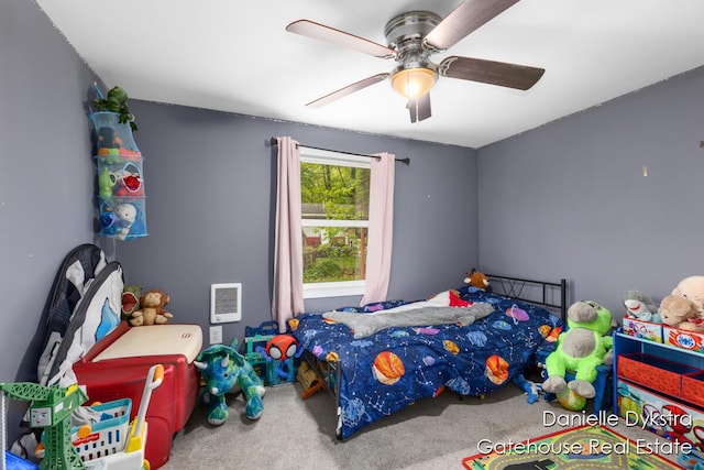 11660 Wren Dr, Lakeview, MI 48850 - carpeted bedroom featuring a ceiling fan and heating unit