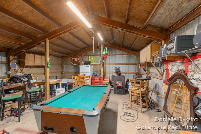 11660 Wren Dr, Lakeview, MI 48850 - game room featuring vaulted ceiling, concrete floors, billiards, and a garage