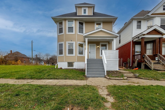 1426 Canton St, Detroit, MI 48207 - american foursquare style home with a front lawn