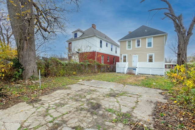 1426 Canton St, Detroit, MI 48207 - back of property with a chimney
