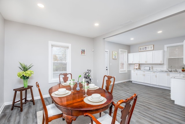 1426 Canton St, Detroit, MI 48207 - dining area featuring wood finished floors, baseboards, and recessed lighting
