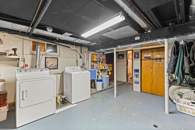 449 Spruce St, Wyandotte, MI 48192 - unfinished basement with washing machine and clothes dryer
