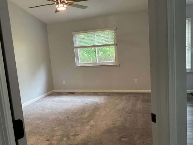 6561 Deerhurst Dr, Westland, MI 48185 - carpeted spare room featuring ceiling fan and baseboards