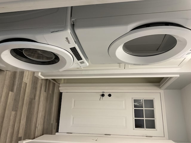 6561 Deerhurst Dr, Westland, MI 48185 - laundry area featuring stacked washer / drying machine