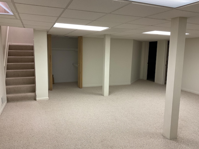 6561 Deerhurst Dr, Westland, MI 48185 - finished below grade area with carpet, stairs, a drop ceiling, and baseboards