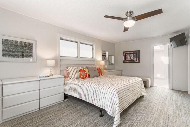 7361 N Shore Dr, South Haven, MI 49090 - bedroom featuring light carpet, ceiling fan, a textured ceiling, and ensuite bath