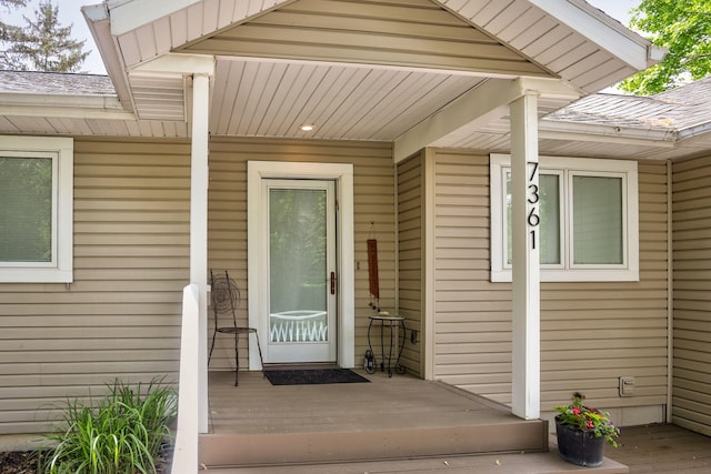 7361 N Shore Dr, South Haven, MI 49090 - view of exterior entry with a wooden deck