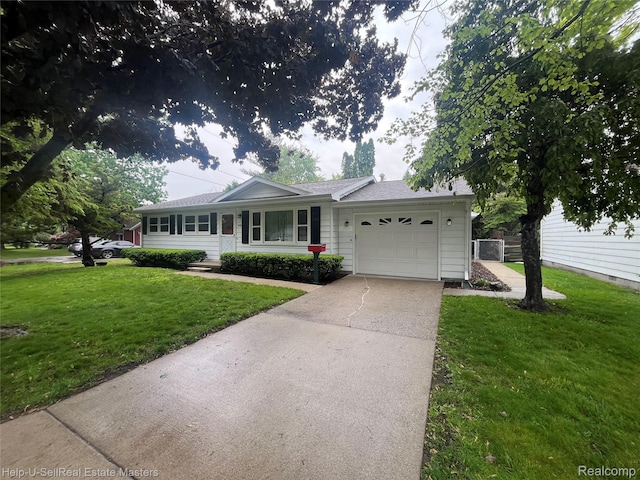 1420 Jones, Port Huron, MI 48060 - ranch-style house featuring driveway, an attached garage, a front yard, and a shingled roof