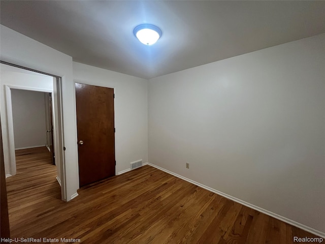 1420 Jones, Port Huron, MI 48060 - unfurnished room with wood finished floors and baseboards