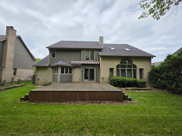 5893 Christina Dr, West Bloomfield, MI 48324 - back of house with a deck, brick siding, a lawn, and a chimney