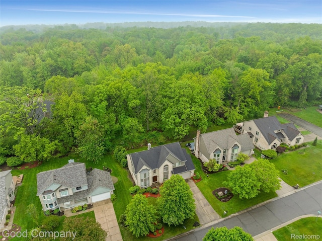5893 Christina Dr, West Bloomfield, MI 48324 - aerial view of residential area with a heavily wooded area