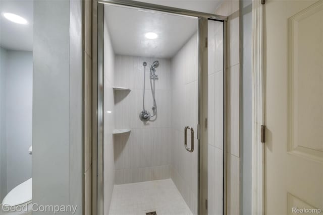 5893 Christina Dr, West Bloomfield, MI 48324 - bathroom featuring a stall shower, toilet, and recessed lighting