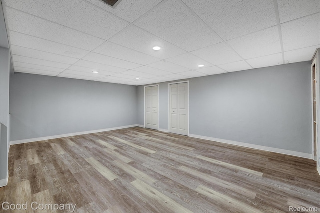 5893 Christina Dr, West Bloomfield, MI 48324 - spare room featuring wood finished floors, baseboards, a drop ceiling, and recessed lighting