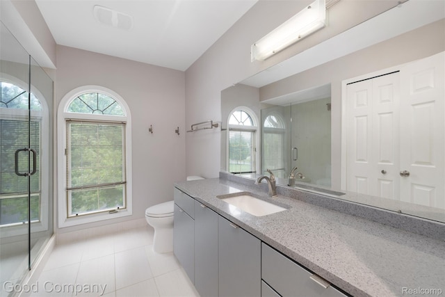 5893 Christina Dr, West Bloomfield, MI 48324 - full bath featuring toilet, vanity, a shower stall, tile patterned flooring, and baseboards
