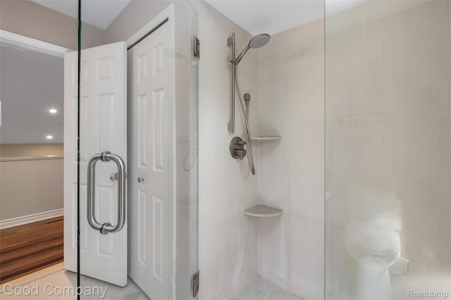 5893 Christina Dr, West Bloomfield, MI 48324 - bathroom featuring a shower stall and toilet