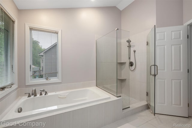 5893 Christina Dr, West Bloomfield, MI 48324 - bathroom featuring a bath, a shower stall, and tile patterned floors