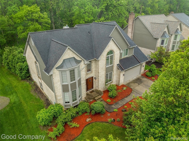 5893 Christina Dr, West Bloomfield, MI 48324 - aerial view of property and surrounding area featuring a forest