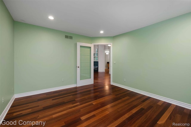 5893 Christina Dr, West Bloomfield, MI 48324 - empty room featuring baseboards, dark wood finished floors, and recessed lighting