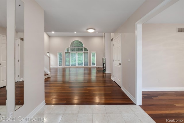 5893 Christina Dr, West Bloomfield, MI 48324 - hall featuring wood-type flooring, stairway, recessed lighting, and baseboards