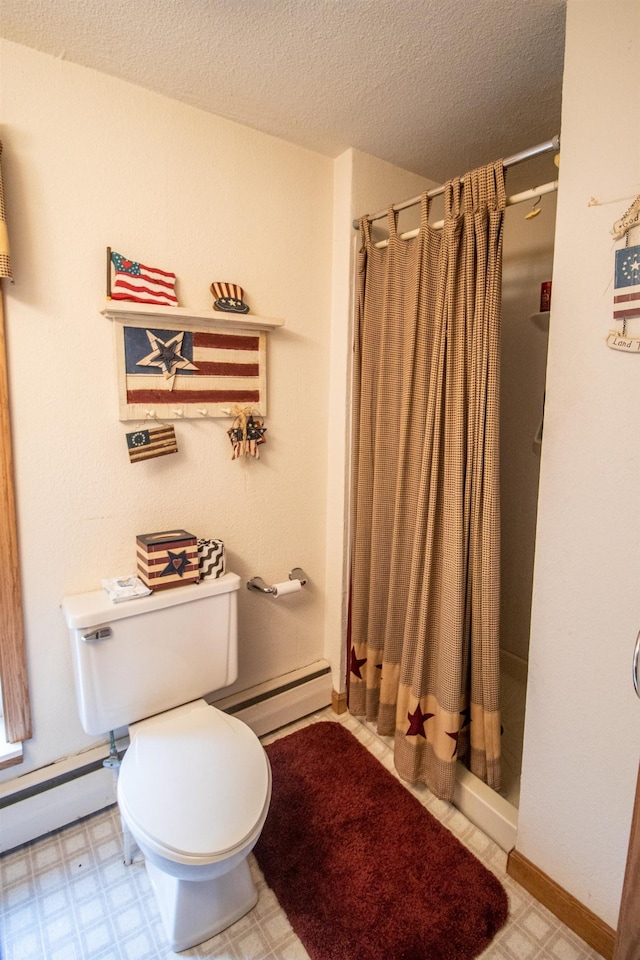 full bathroom featuring a baseboard heating unit, a stall shower, a textured ceiling, tile patterned floors, and toilet